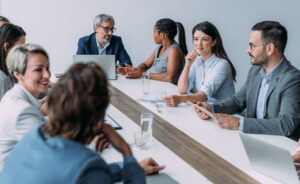 Group of business persons in business meeting. 